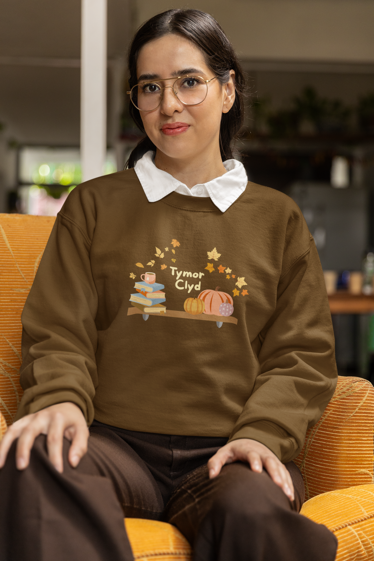 Tymor Clyd (Cosy Season) Welsh language autumn sweatshirt with bookshelf