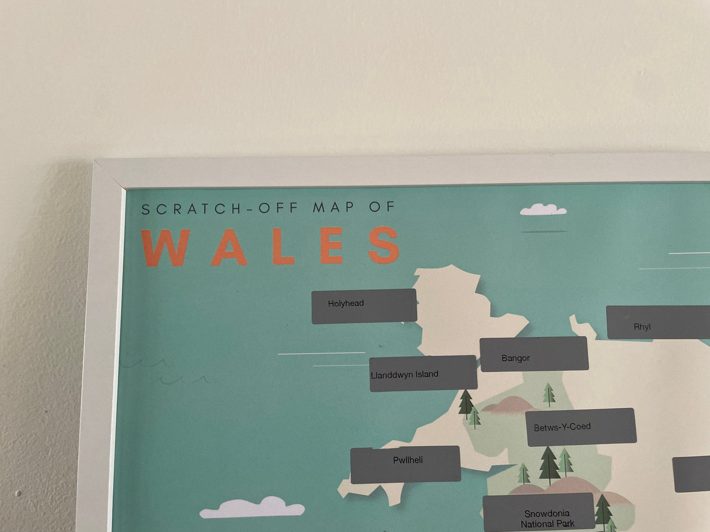 Framed scratch-off map of places to visit in Wales